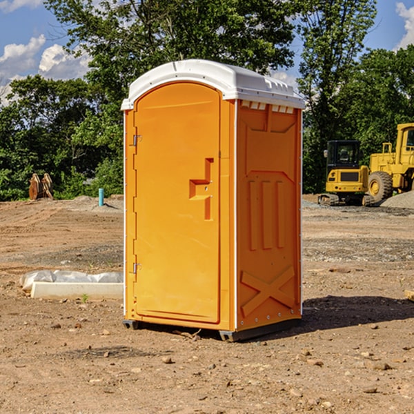 how often are the portable restrooms cleaned and serviced during a rental period in Monroe